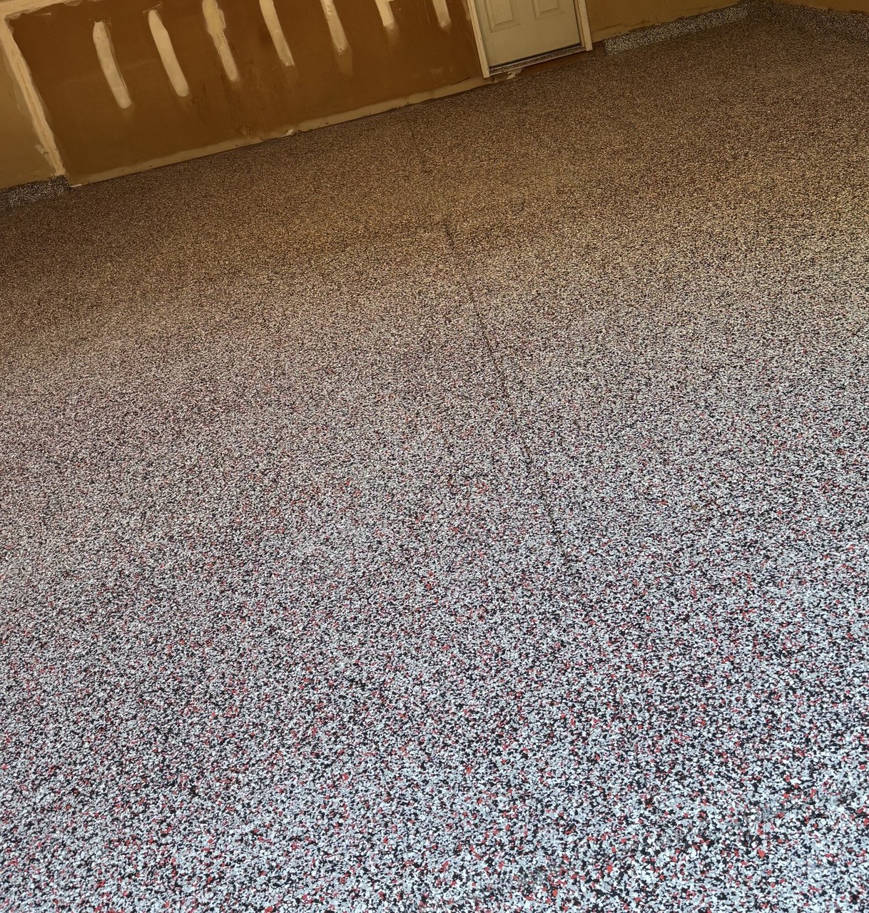 Red and black flake epoxy garage floor