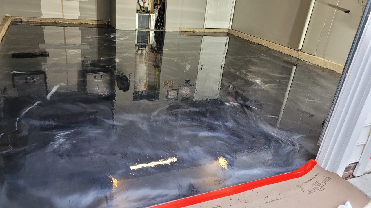 Silver metallic epoxy showroom floor