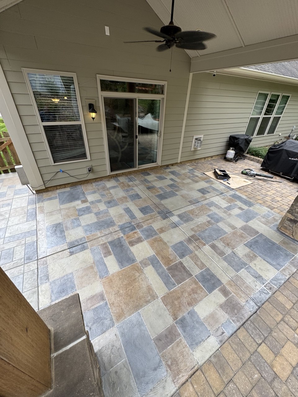 Stamped tile-pattern concrete overlay patio