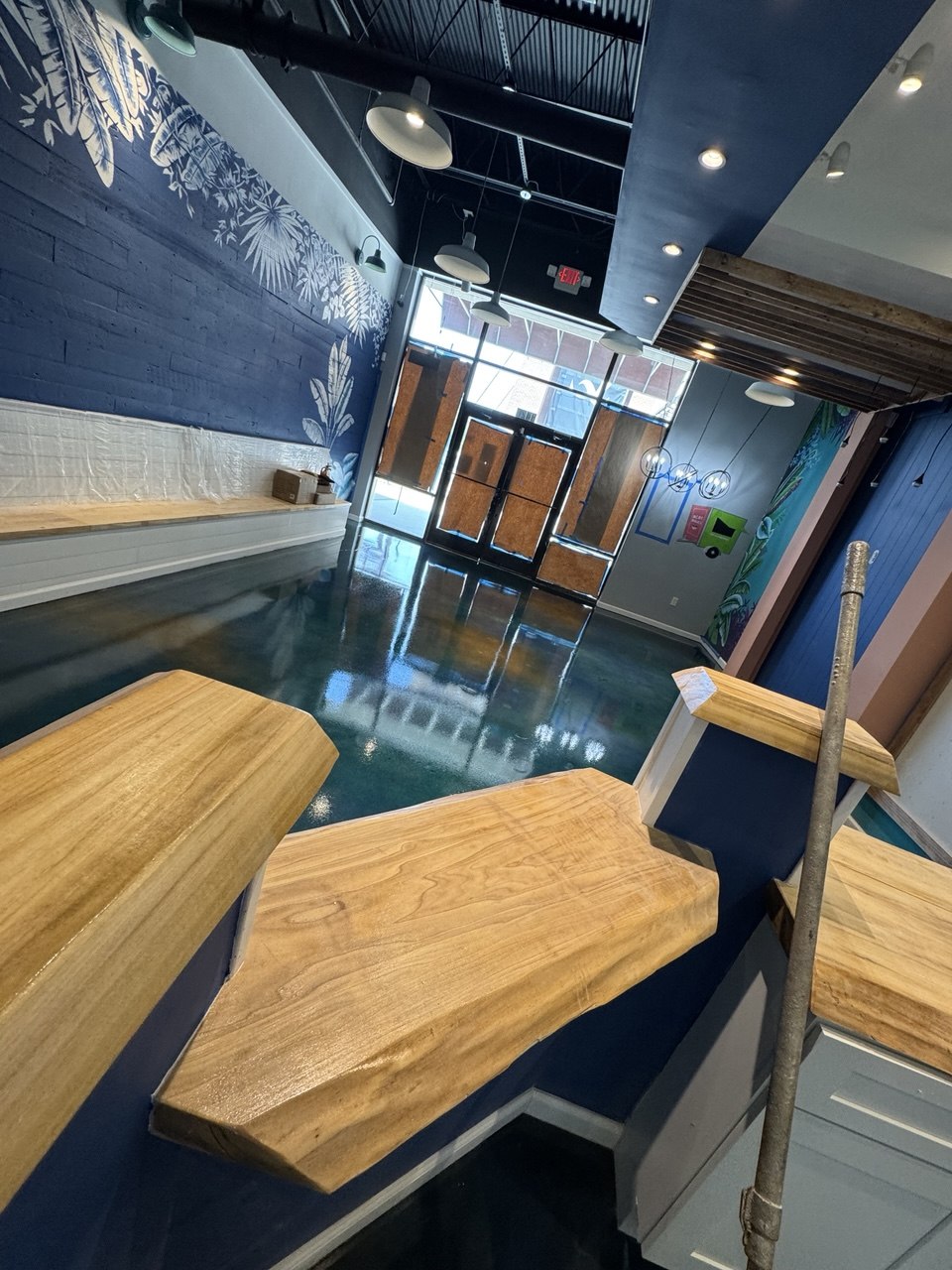 Blue metallic epoxy shop floor
