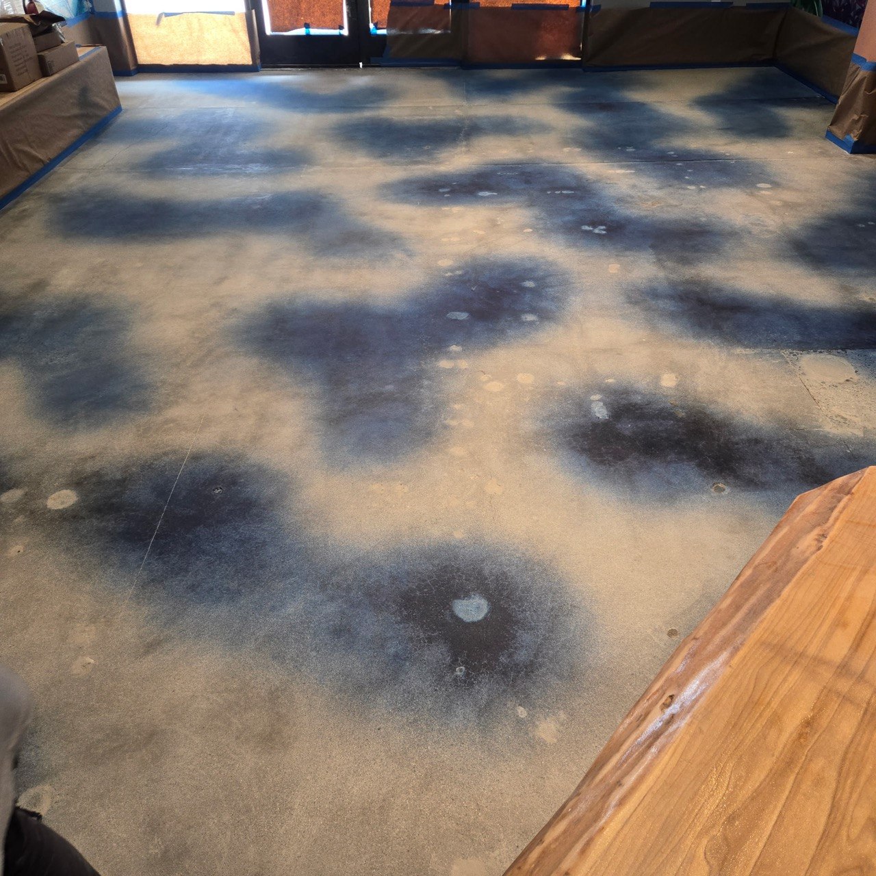 Blue cloud pattern acid-stained concrete floor