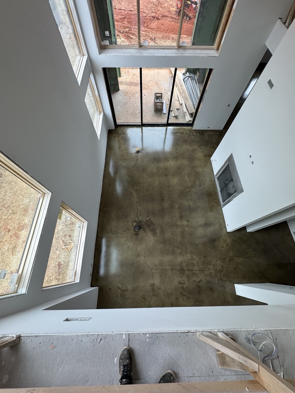 Olive stained polished concrete