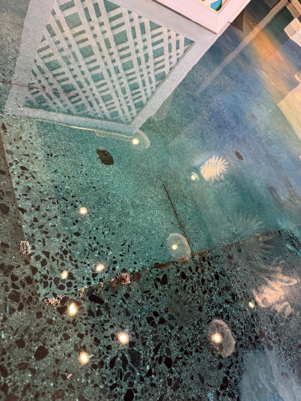 Teal stained concrete closeup detail